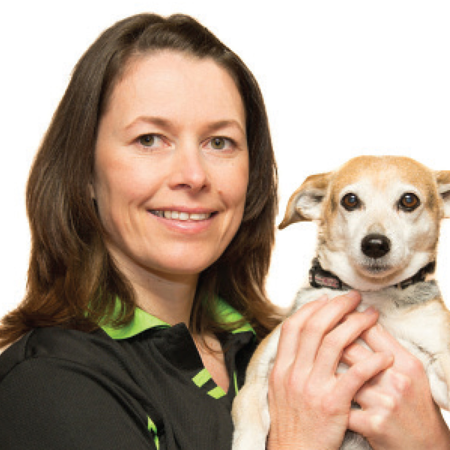 Dr. Megan Kelly headshot with dog