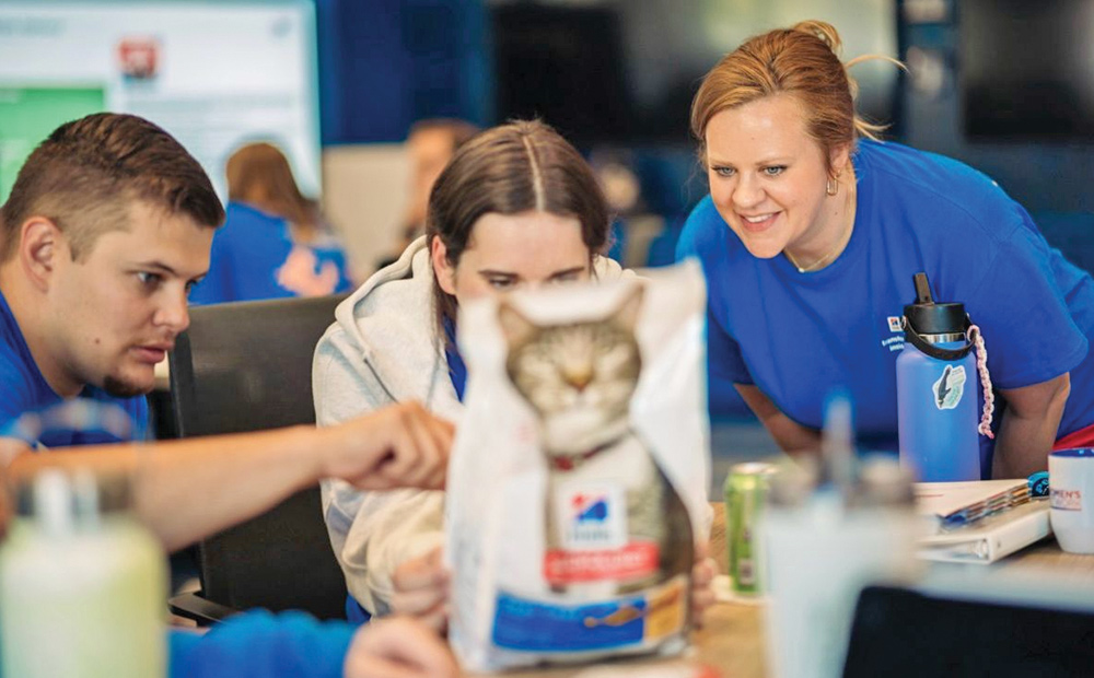 Dr. Emily Dohrman pictured with Hill's Pet Nutrition volunteers at an event.